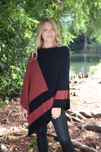 Asymmetrical possum merino poncho with geometric pattern in contrast colour. Textured knit structure feature in contrast panel. Lothlorian. Made in New Zealand. Dusk