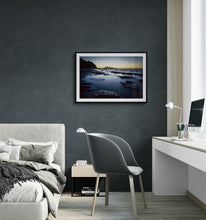 Load image into Gallery viewer, Blue dusk West Coast photography print by Stewart Nimmo displayed in a dark interior with a black frame