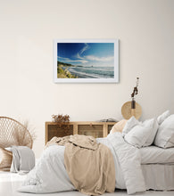 Load image into Gallery viewer, Rapahoe West Coast landscape photography print displayed in a white frame in a modern bedroom