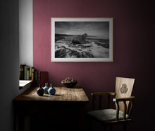Load image into Gallery viewer, Moody South Westland coastal landscape print displayed in a dark interior with oak frame