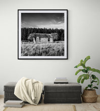 Load image into Gallery viewer, Framed in black Derelict House black and white fine art print displayed above a sideboard