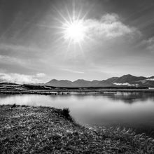 Load image into Gallery viewer, Sunburst black and white photograph of Lake Heron and the Canterbury high country by Stewart Nimmo