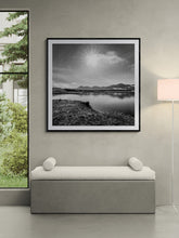 Load image into Gallery viewer, Framed Sunburst black and white landscape photograph displayed above a console table