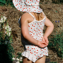 Load image into Gallery viewer, Child wearing Frill swimsuit by nature baby in joiette print