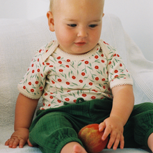 Load image into Gallery viewer, baby wearing short sleeve bodysuit by nature baby in joiette print