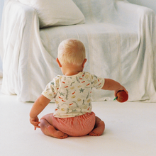 Load image into Gallery viewer, baby wearing nature baby clothing and bodysuit in snorkel print
