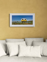 Load image into Gallery viewer, Whitebaiting Caravan Turnbull River landscape print by Stewart Nimmo framed in a bedroom