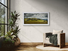 Load image into Gallery viewer, Framed Castle Hill landscape photography displayed in a warm modern living room with a white frame