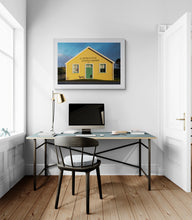 Load image into Gallery viewer, Donovan’s Store fine art photography print displayed framed in white above a desk