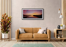 Load image into Gallery viewer, Sunset reflected in the Grey River at Greymouth, West Coast New Zealand framed in black in a modern interior
