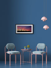 Load image into Gallery viewer, Framed Greymouth sunset landscape photograph displayed against a blue wall