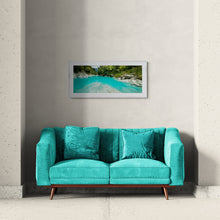 Load image into Gallery viewer, Hokitika Gorge fine art landscape print displayed above a turquoise sofa in a contemporary interior