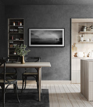 Load image into Gallery viewer, Framed Lake Brunner Houseboat black and white print by Stewart Nimmo displayed in a modern interior
