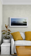 Load image into Gallery viewer, Framed Lake Kaniere landscape photography print by Stewart Nimmo displayed in white frame in a living room