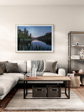 Load image into Gallery viewer, Framed Lake Matheson fine art landscape print displayed above a neutral corner sofa.