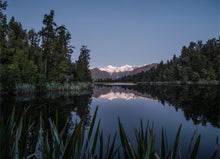 Load image into Gallery viewer, Lake Matheson reflecting the Southern Alps near Fox Glacier on the West Coast of New Zealand, photographed by Stewart Nimmo.