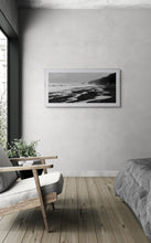 Load image into Gallery viewer, Cobden Beach Foam black and white panoramic fine art print displayed framed in a contemporary interior