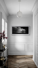 Load image into Gallery viewer, Sun Rays black and white West Coast landscape print displayed in a contemporary interior