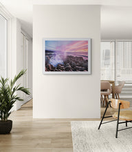 Load image into Gallery viewer, Framed Punakaiki Blowholes Sunset print displayed on a feature wall in a light modern apartment