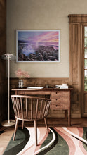 Load image into Gallery viewer, Framed Punakaiki Blowholes Sunset fine art photograph displayed above a wooden desk in a traditional study