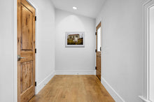 Load image into Gallery viewer, Seddonville Goat West Coast photography print displayed in a bright hallway