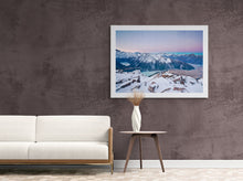 Load image into Gallery viewer, Framed Southern Alps and Mueller Hut landscape photograph by Stewart Nimmo displayed on a dark wall in a white frame