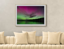 Load image into Gallery viewer, Aurora Stewart Island photography print displayed above a cream sofa