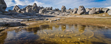 Load image into Gallery viewer, Reflections in Castle Hill Pond beneath the limestone formations of Kura Tāwhiti, Canterbury, New Zealand