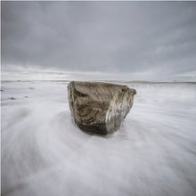 Load image into Gallery viewer, Lone Rock surrounded by moving water at Okarito on the West Coast of New Zealand, photographed by Stewart Nimmo