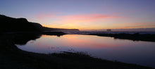 Load image into Gallery viewer, Sunset reflected in the water at Rapahoe Beach near Greymouth on the West Coast of New Zealand, photographed by Stewart Nimmo