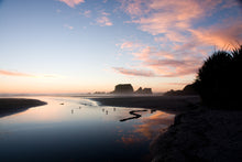 Load image into Gallery viewer, Sunset reflected across the water at Tauranga Bay near Westport on the West Coast of New Zealand